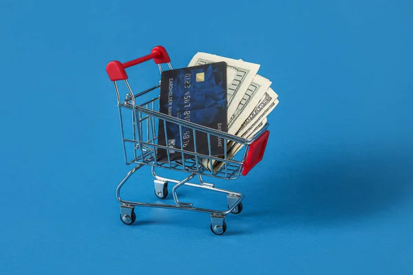 Shopping Cart Credit Card Dollar Banknotes Blue Background — Stock Photo, Image