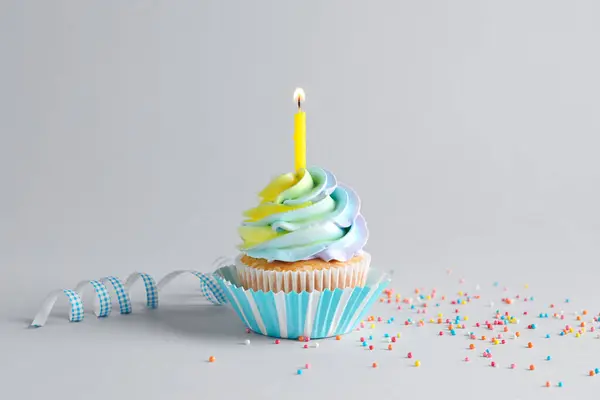 Delicious Birthday Cupcake Burning Candle Grey Background Stock Image