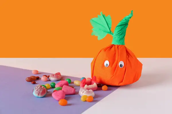 배경에 할로윈과 맛있는 사탕을위한 — 스톡 사진