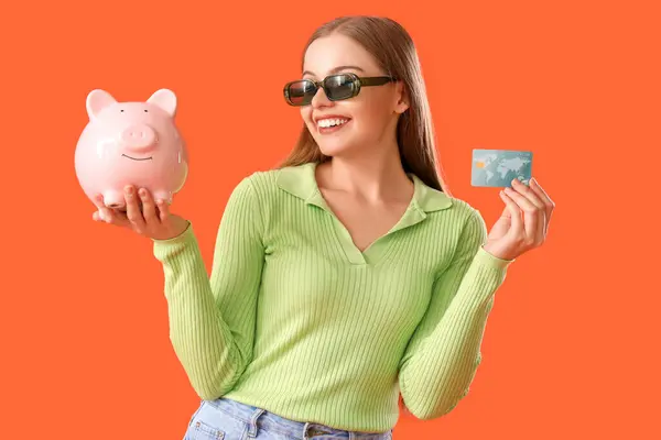 Young Woman Credit Card Piggy Bank Color Background — Stock Photo, Image