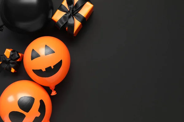 Olika Roliga Halloween Ballonger Och Presentförpackningar Svart Bakgrund — Stockfoto