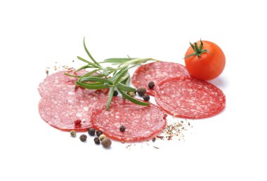 Slices of tasty salami with tomato and spices isolated on white background