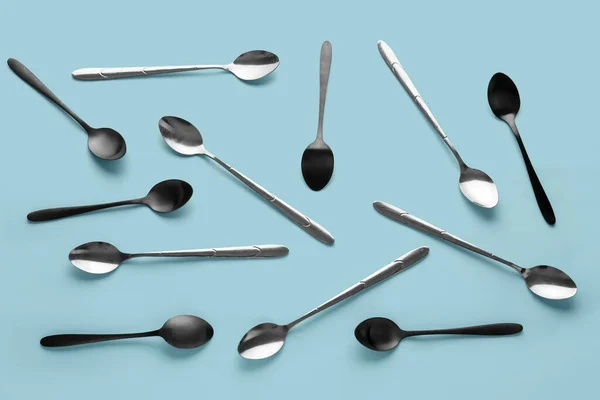 Stainless Steel Spoons Blue Background — Stock Photo, Image