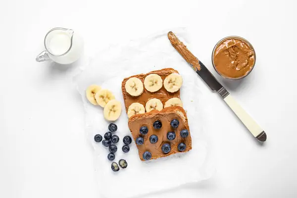Baking Paper Toasts Peanut Butter Fresh Fruits White Background — Stock Photo, Image