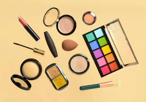 Different Decorative Cosmetics Yellow Background — Stock Photo, Image