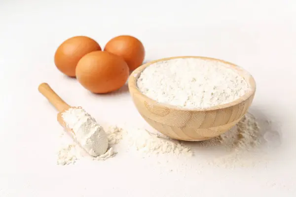 Wooden Bowl Wheat Flour Scoop Eggs White Background — Stock Photo, Image