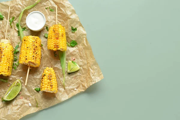 Baking Paper Tasty Grilled Corn Cob Skewers Sauce Green Background — Stock Photo, Image