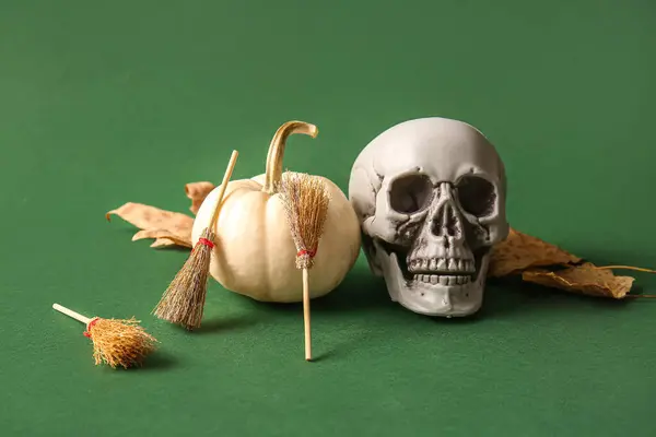 Halloween Composition Pumpkin Skull Brooms Green Background — Stock Photo, Image