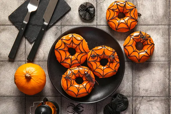 Plate Tasty Donuts Halloween Candies Pumpkin Grey Tile Background — Stock Photo, Image
