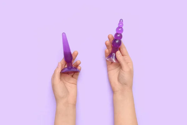 Woman Anal Plugs Sex Shop Lilac Background — Stock Photo, Image