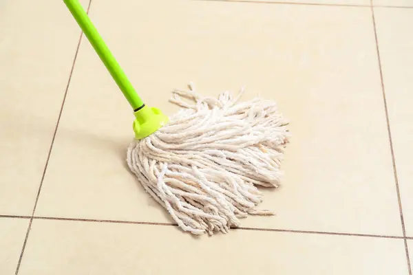 Mop Light Tile Floor Closeup — Stock Photo, Image