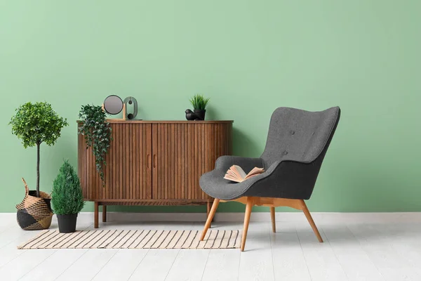 Interior Living Room Grey Armchair Wooden Cabinet Striped Rug — Zdjęcie stockowe