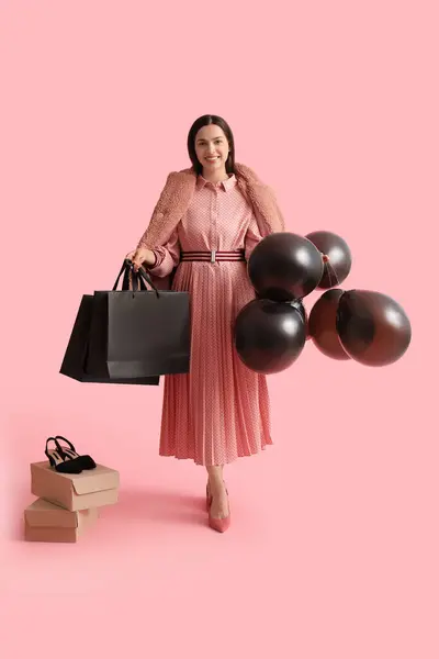 Beautiful Young Woman Shopping Bags Cardboard Boxes Balloons Pink Background — Stock Photo, Image