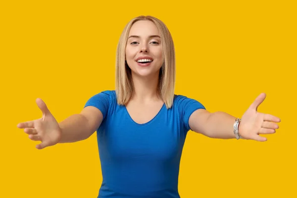 Young Woman Opening Arms Hug Yellow Background — Stock Photo, Image