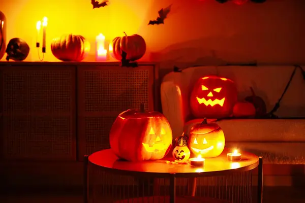 Halloween Pumpkins Candies Burning Candles Table Dark Living Room — Stock Photo, Image