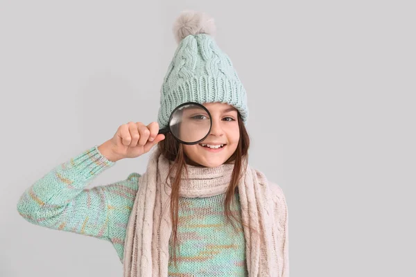 Cute Little Girl Winter Clothes Magnifier Lilac Background — Stock Photo, Image