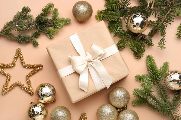 Christmas Tree Branches Gift Box Balls Beige Background — Stock Photo, Image