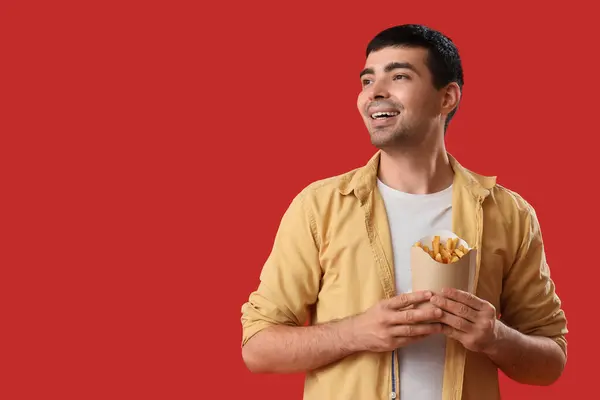 Young Man French Fries Red Background — Stock Photo, Image