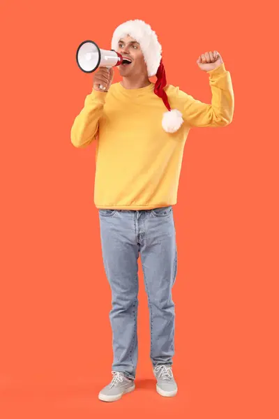 Happy Young Man Santa Hat Megaphone Orange Background — Stock Photo, Image