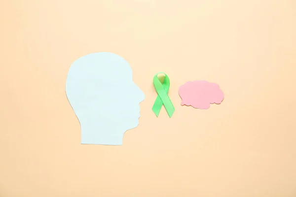 Paper Human Head Brain Green Awareness Ribbon Beige Background Mental — Stock Photo, Image