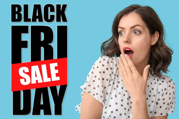 Surprised young woman and text BLACK FRIDAY SALE on light blue background