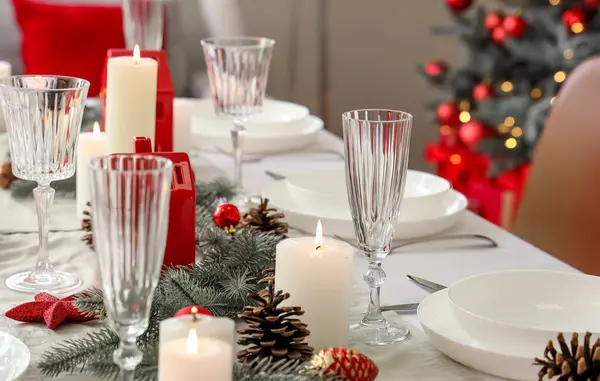 Festive table setting with Christmas decor at home