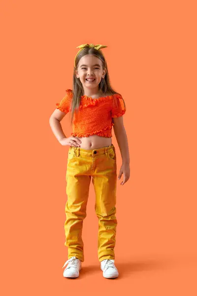 Stylish Little Girl Orange Background — Stock Photo, Image