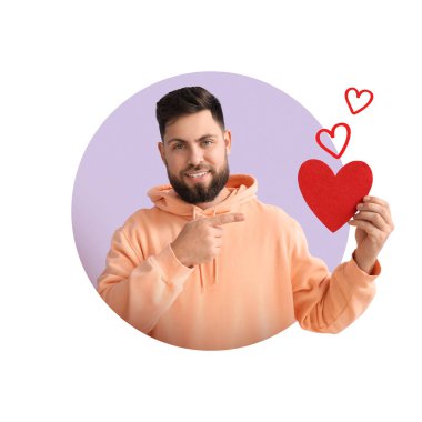 Genç sakallı adam beyaz arka planda kırmızı kalbi işaret ediyor.