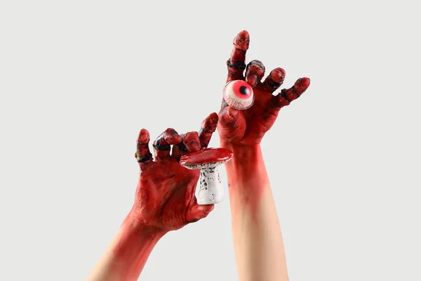 Mãos Zumbis Manchadas Sangue Segurando Globo Ocular Cogumelo Fundo Branco — Fotografia de Stock