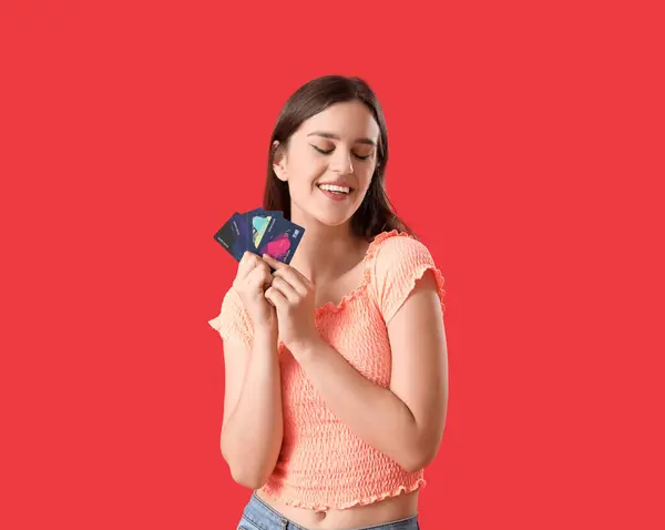 Young Woman Credit Cards Red Background — Stock Photo, Image