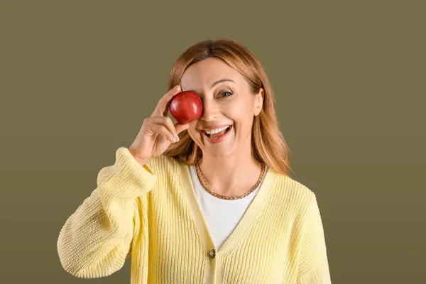 Mature Woman Tasty Apple Green Background — Stock Photo, Image