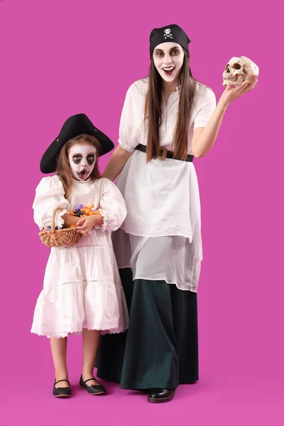 Little Girl Candies Her Mother Dressed Halloween Pirates Purple Background — Stock Photo, Image