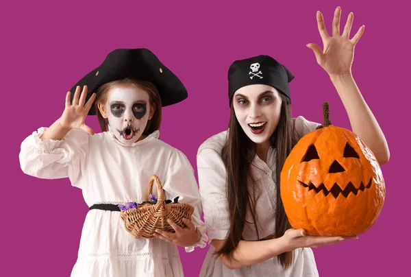 Little Girl Candies Her Mother Dressed Halloween Pirates Purple Background — Stock Photo, Image