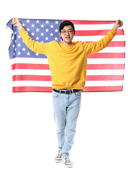 Young Asian man with USA flag on white background
