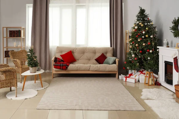 Interior of living room with sofa and Christmas tree