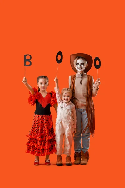 Little Children Dressed Halloween Word Boo Orange Background — Stock Photo, Image