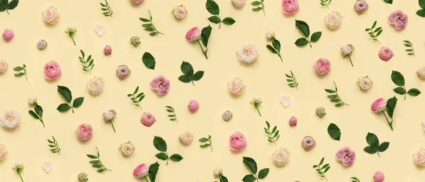 Many beautiful roses on beige background. Pattern for design