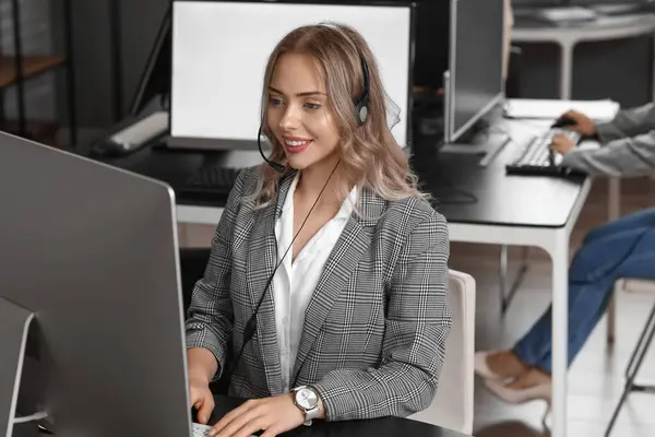 Female technical support agent  working in office