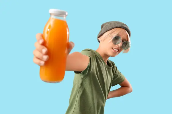 Little Boy Bottle Juice Blue Background — Stock Photo, Image