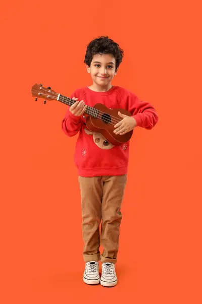 Cute Little Boy Playing Guitar Orange Background — Stock Photo, Image