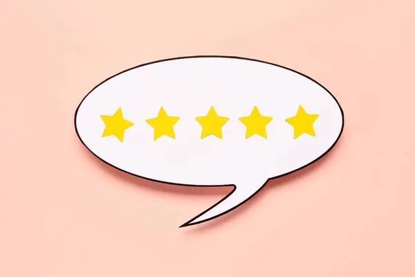 Speech bubble with five stars rating on pink background. Customer experience concept