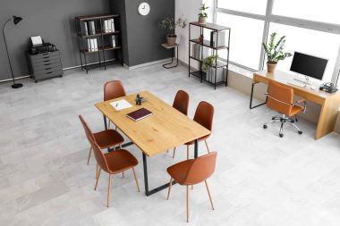 Interior of conference hall with tables in office clipart