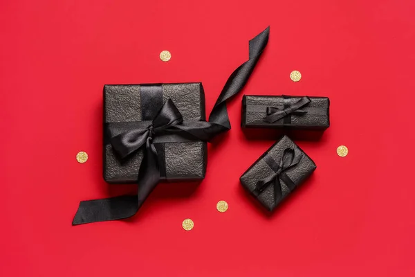 Gift Boxes Confetti Red Background Black Friday — Stock Photo, Image