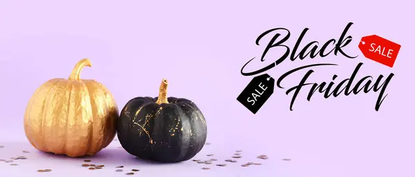 Painted pumpkin and text BLACK FRIDAY on lilac background