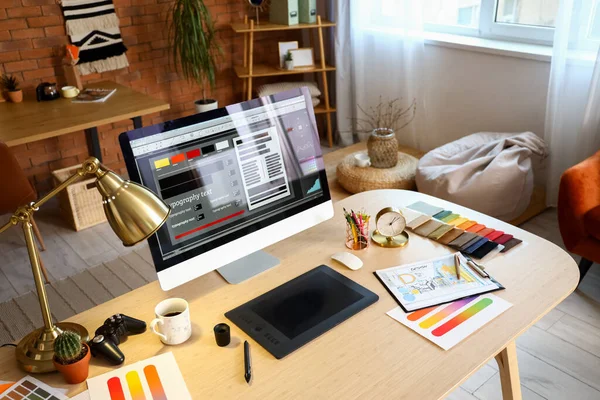 Interior designer\'s workplace with computer and graphic tablet in office