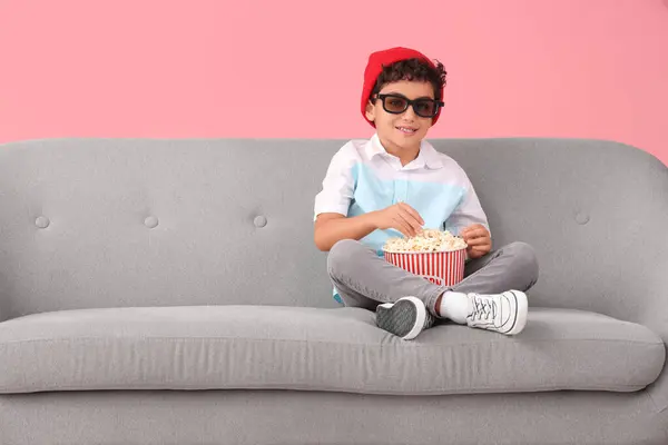 Little Boy Glasses Popcorn Watching Movie Sofa Pink Background — Stock Photo, Image