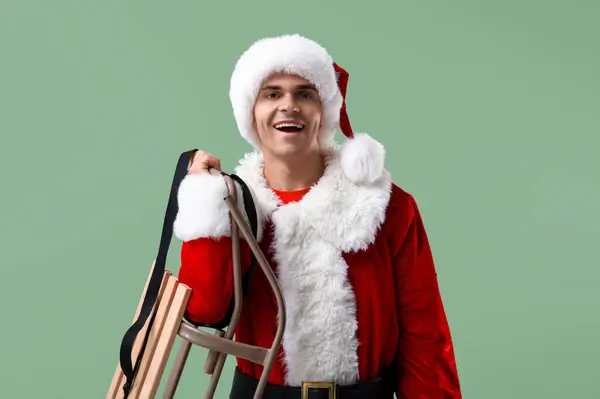 Santa Claus Saněmi Zeleném Pozadí — Stock fotografie