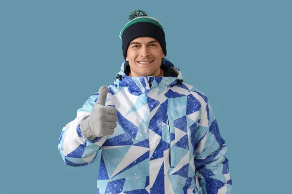 Handsome Man Winter Clothes Showing Thumb Blue Background — Stock Photo, Image