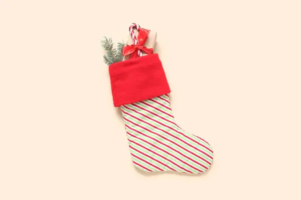 Christmas Sock Fir Branch Gift Box Candy Cane Beige Background — Stock Photo, Image