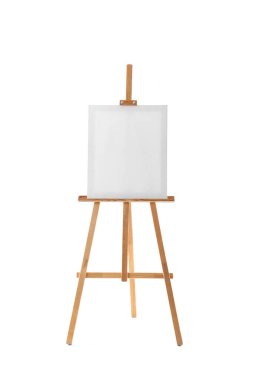 Beyaz zemin üzerinde boş tuval ile ahşap sehpa